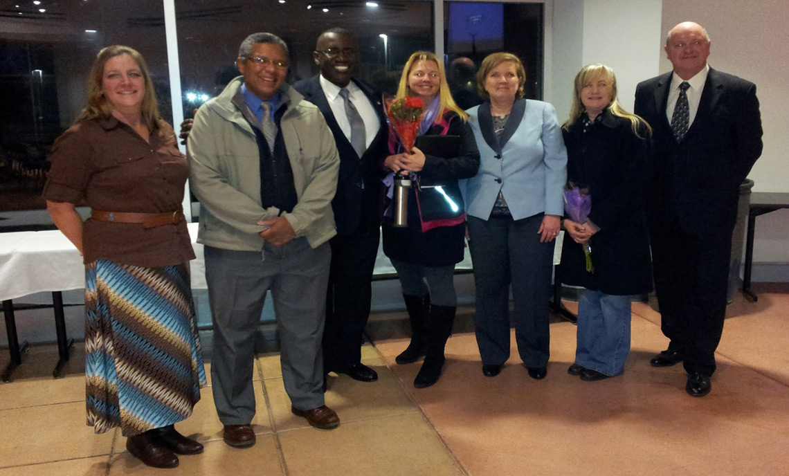 Dr. Lonnie L. Howard congratulates the recently tenured faculty.