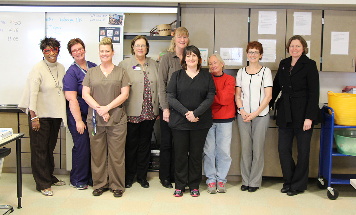 Clover Park Technical College Esthetic Sciences instructor Jennifer Whipple is joined by her colleagues and college administrators in recognition of her selection as the 2017 NISOD Excellence Award recipient.