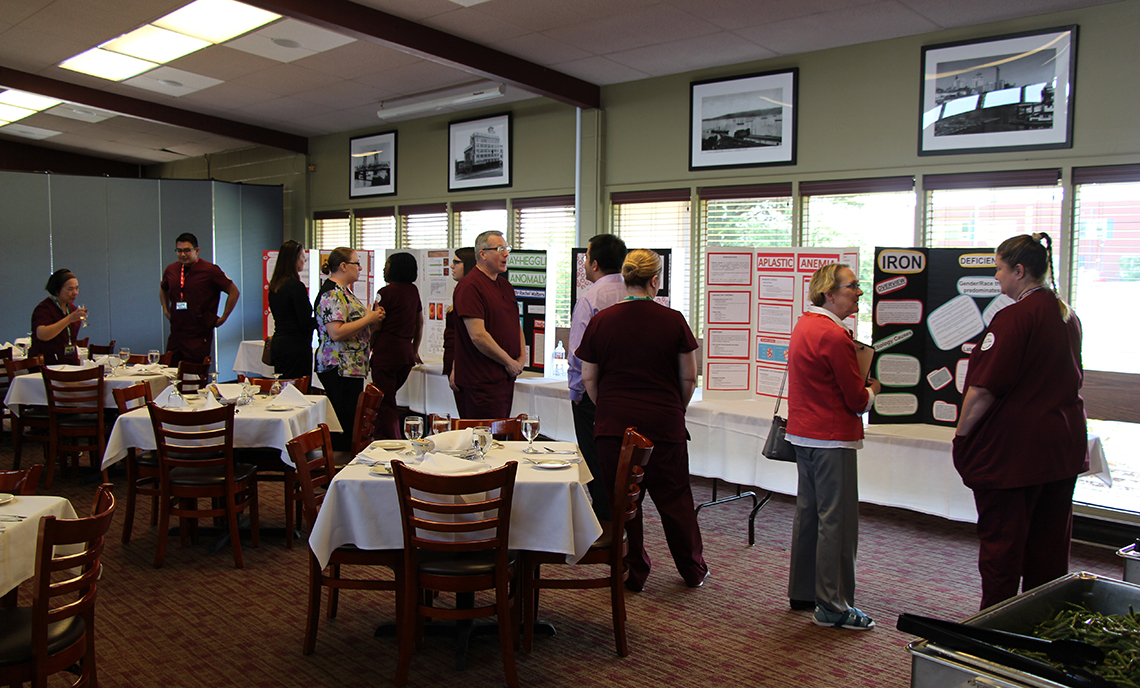 CPTC MLT students present their projects and converse with clinical site representatives