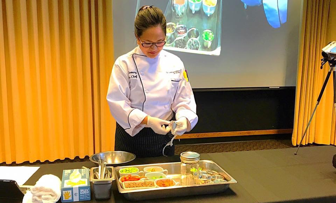 CPTC Culinary Arts alum Jo Soeung conducts a culinary demonstration.