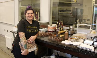 Clover Park Technical College Pastry Arts alum Mollie Stewart experiments with different color and flavor combinations for her chocolate creations.