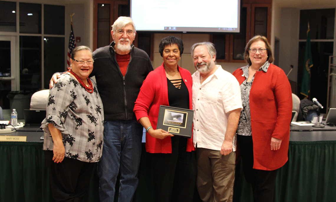 Mary Moss (center) joins fellow CPTC Trustees (from left) Lua Pritchard, Wayne Withrow, and Bruce Lachney, along with CPTC President Joyce Loveday as the board recognized Moss at her final meeting in December.