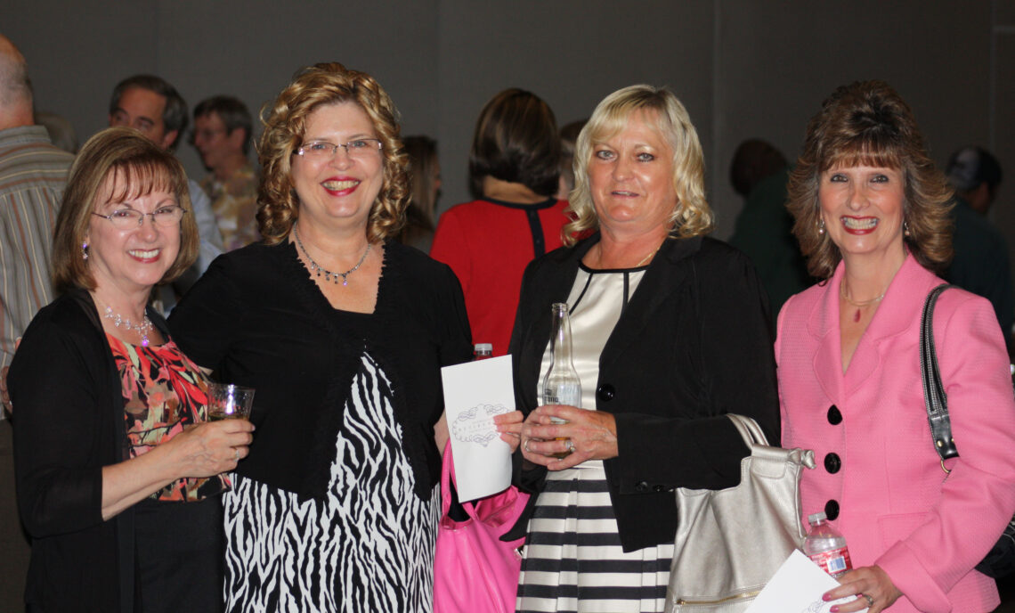 Chris Lewis (in pink) at Dr. John W. Walstrum’s retirement