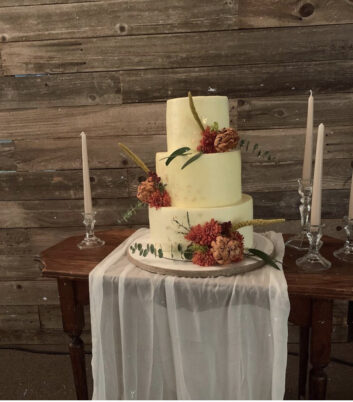 three- tiered white wedding cake