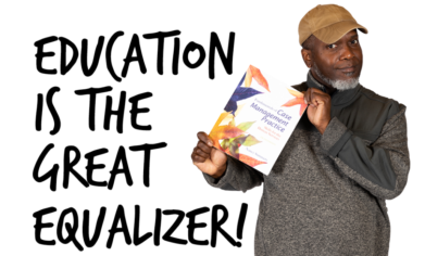 Black man holding a textbook with words "Education is the great equalizer."