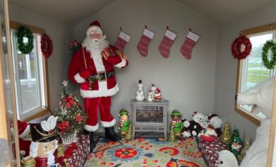 Room decorated with a Santa and Christmas decorations