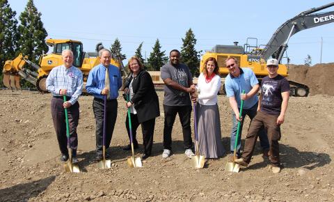 Group of people with shovels