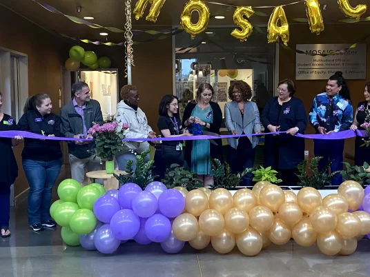 people at grand opening of Clover Park Technical College cut ceremonial ribbon for MOSAIC Center