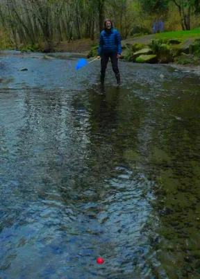 Mira prepares to catch a test float just above the confluence of Chambers and Leach Creeks