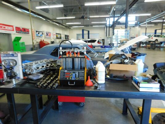 Photo Marcia Wilson. Always busy but neat as a pin, the students run a tight, clean ship around the cars.